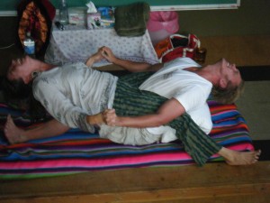 Hands-On Energetic Sex with Reid Mihalko Reid demonstrates the what he calls "Tantric Twitchies" (Kryias) for the audience with the generous help of Amber Seitz at a workshop in Oakland